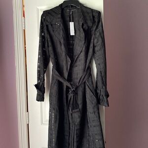 White House Black Market did not miss with this black organza trench coat! Sz M.